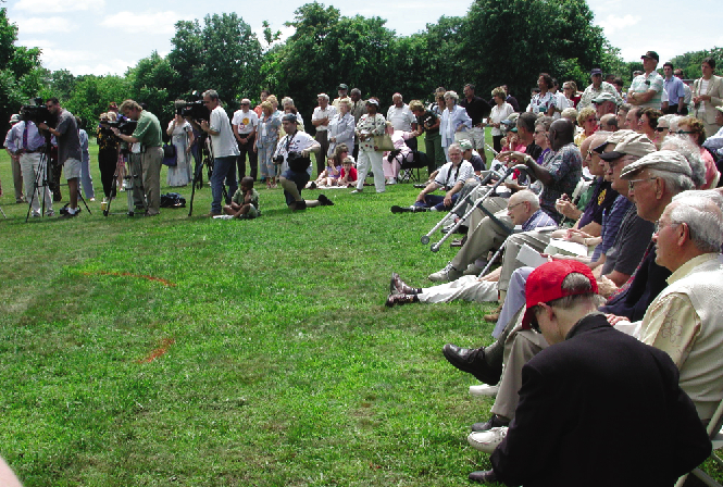 Survivors and family gathered on site for the memorial dedication.