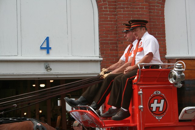 Hallamore Clydesdale drivers - notice the number of reins in the driver's hands.